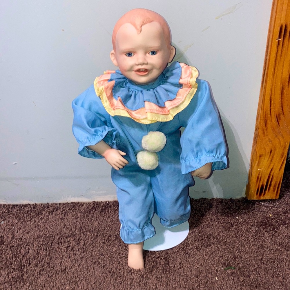 Clown glass doll
